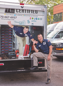 Owner Josh Brooker in front of the TE Electric Truck